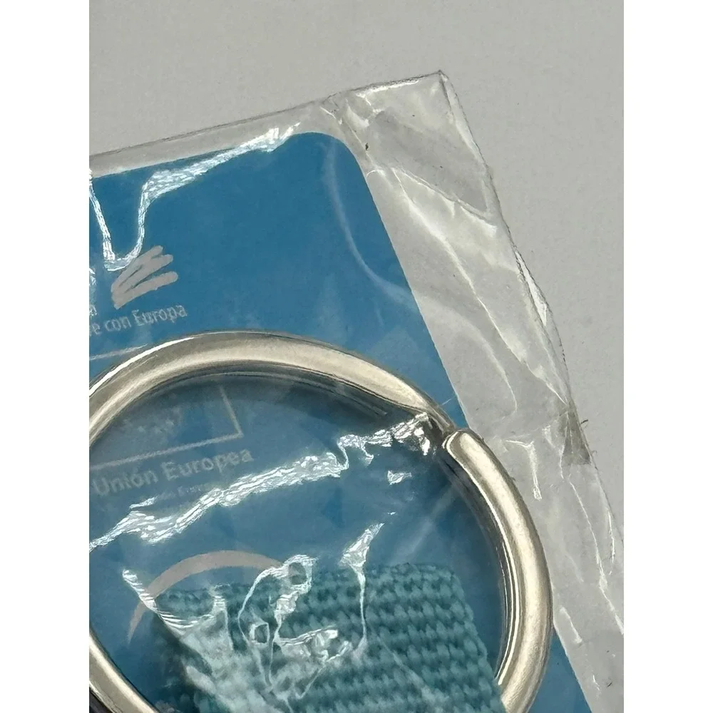 Andalucia Spain Souvenir Keychain Turquoise Woven Strap Brushed Metal Fob NEW‎